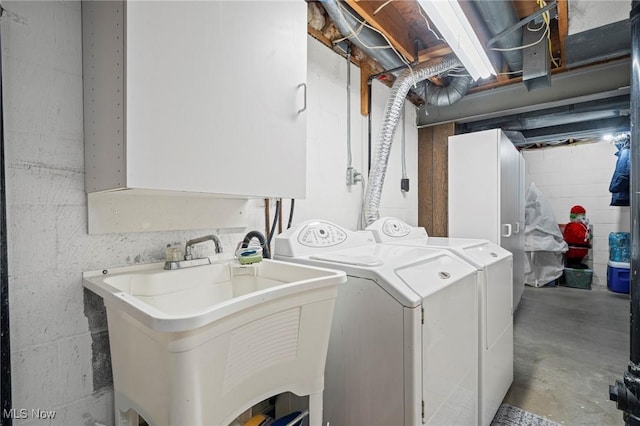 136 Westchester Dr, Brunswick, OH 44212 - washroom with washing machine and clothes dryer and cabinet space