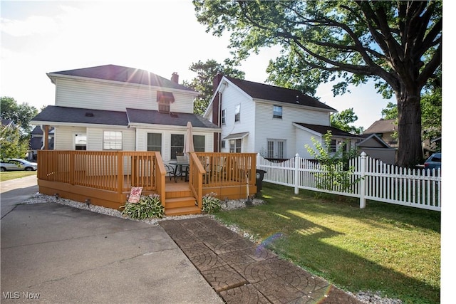 1299 Herberich Ave, Akron, OH 44301 - back of house with a chimney and a deck