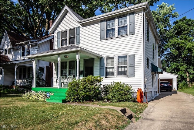 1299 Herberich Ave, Akron, OH 44301 - view of front of house with a porch and a front yard