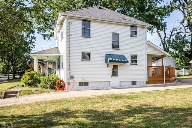 1299 Herberich Ave, Akron, OH 44301 - rear view of house with a yard and a shingled roof