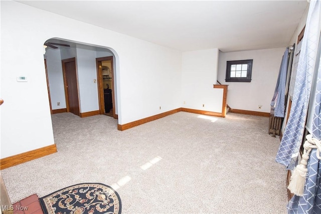 1299 Herberich Ave, Akron, OH 44301 - carpeted spare room featuring arched walkways and baseboards