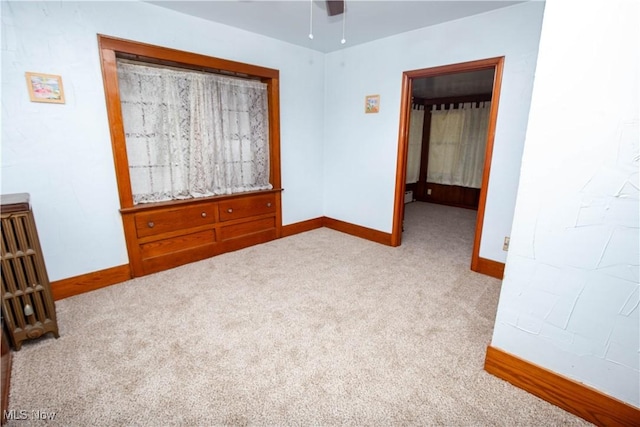 1299 Herberich Ave, Akron, OH 44301 - unfurnished bedroom featuring baseboards and carpet flooring