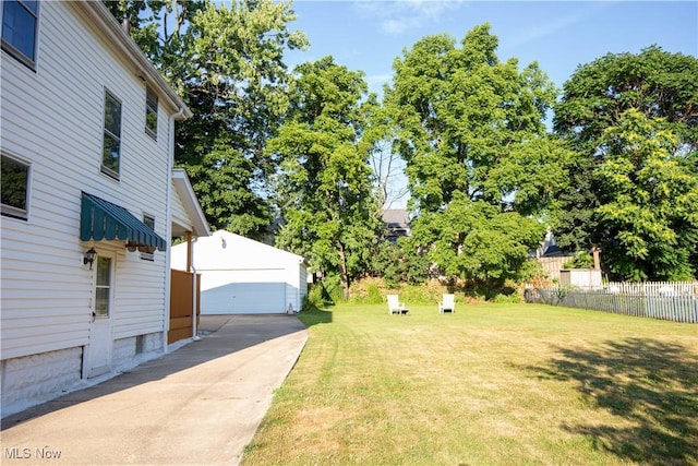 1299 Herberich Ave, Akron, OH 44301 - view of yard featuring an outdoor structure and a garage