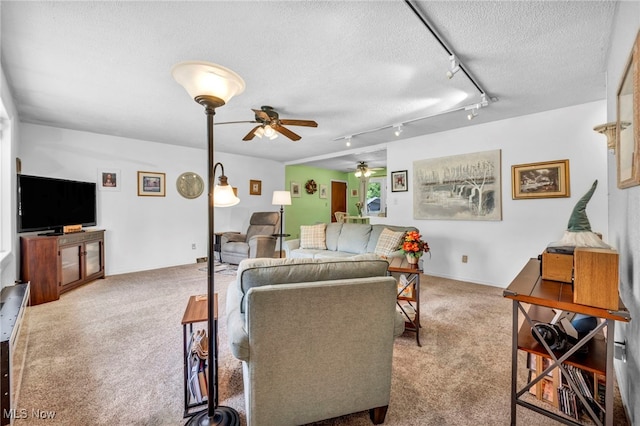 2061 Garden Ln, Hudson, OH 44236 - carpeted living area featuring ceiling fan and a textured ceiling