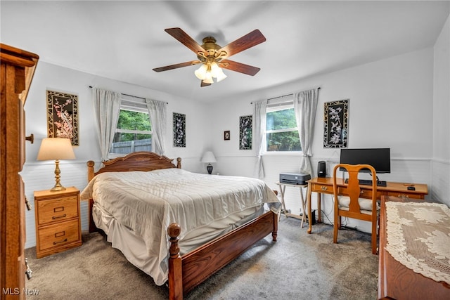 2061 Garden Ln, Hudson, OH 44236 - carpeted bedroom featuring multiple windows, a desk, and a ceiling fan