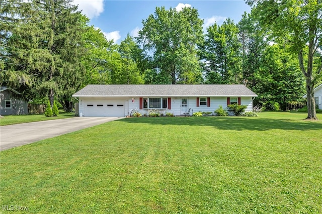 2061 Garden Ln, Hudson, OH 44236 - ranch-style house featuring a garage, driveway, and a front lawn