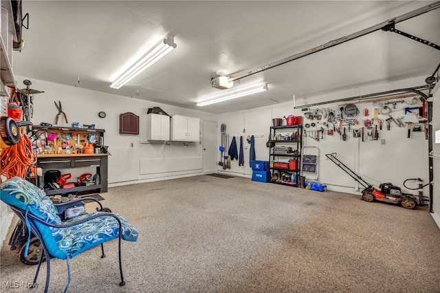 2061 Garden Ln, Hudson, OH 44236 - garage featuring a workshop area and a garage door opener