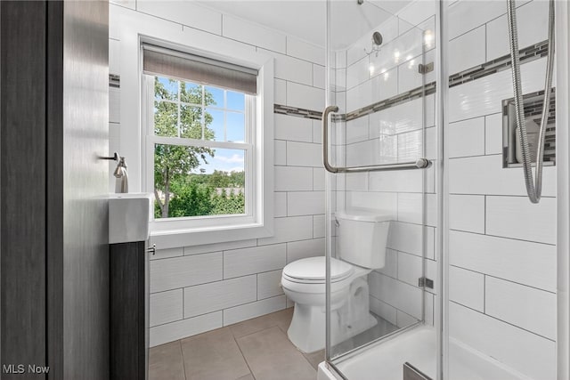 3905 Greenwich Rd, Norton, OH 44203 - bathroom featuring tile patterned floors, a stall shower, and tile walls