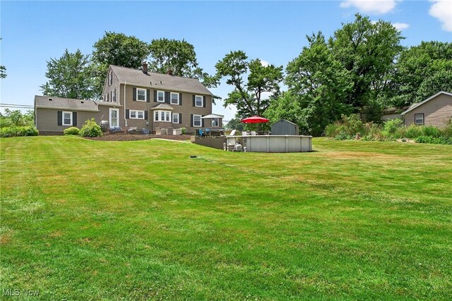 3905 Greenwich Rd, Norton, OH 44203 - view of grassy yard with an outdoor pool