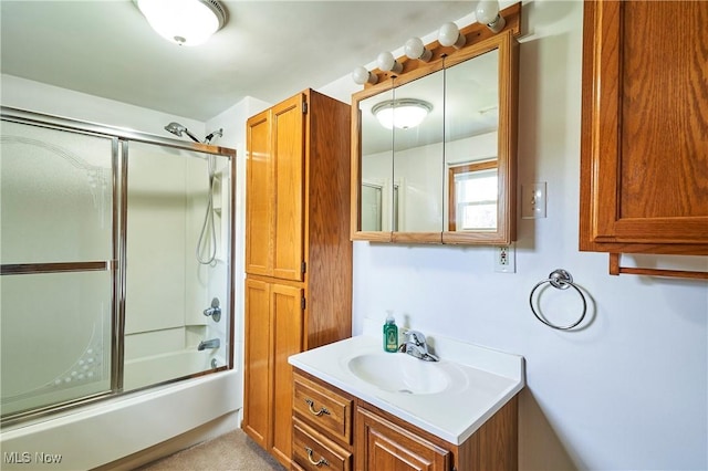 1021 Perry Ave, Barberton, OH 44203 - bathroom featuring vanity and combined bath / shower with glass door