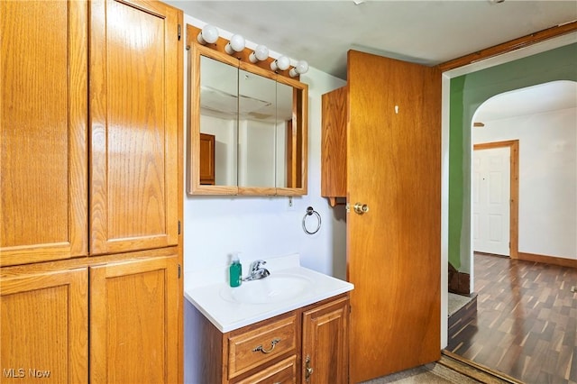 1021 Perry Ave, Barberton, OH 44203 - bathroom with vanity and wood finished floors