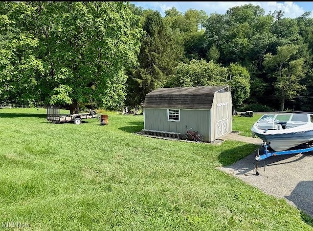 1711 Hardins Run Rd, New Cumberland, WV 26047 - view of grassy yard featuring a shed