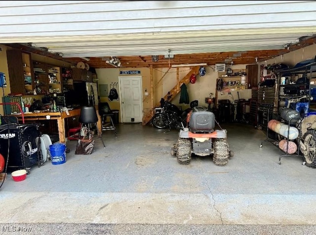 1711 Hardins Run Rd, New Cumberland, WV 26047 - garage with a workshop area and electric panel