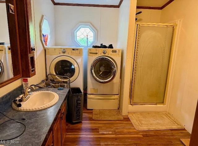 1711 Hardins Run Rd, New Cumberland, WV 26047 - bathroom with independent washer and dryer, a stall shower, ornamental molding, wood finished floors, and vanity