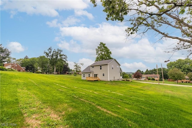 8452 Beatty St NW, Massillon, OH 44646 - view of green lawn with a deck
