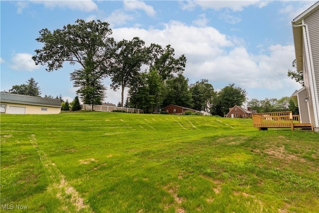 8452 Beatty St NW, Massillon, OH 44646 - view of green lawn with a deck
