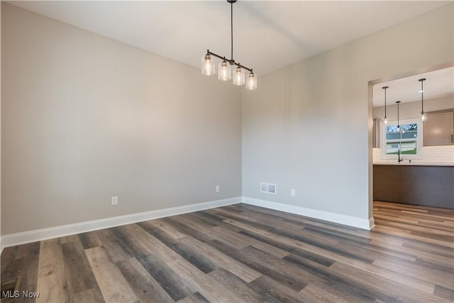 8452 Beatty St NW, Massillon, OH 44646 - unfurnished room with dark wood-style flooring