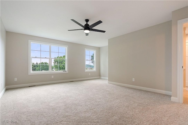 8452 Beatty St NW, Massillon, OH 44646 - carpeted empty room featuring ceiling fan and baseboards