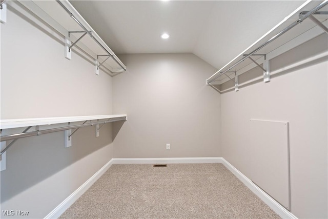 8452 Beatty St NW, Massillon, OH 44646 - walk in closet with carpet flooring and lofted ceiling