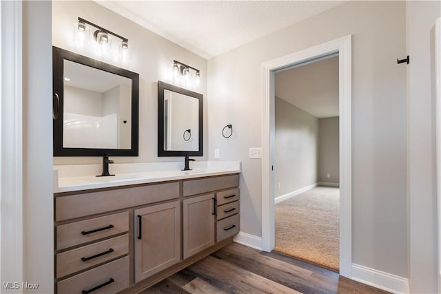 8452 Beatty St NW, Massillon, OH 44646 - full bath with double vanity and wood finished floors