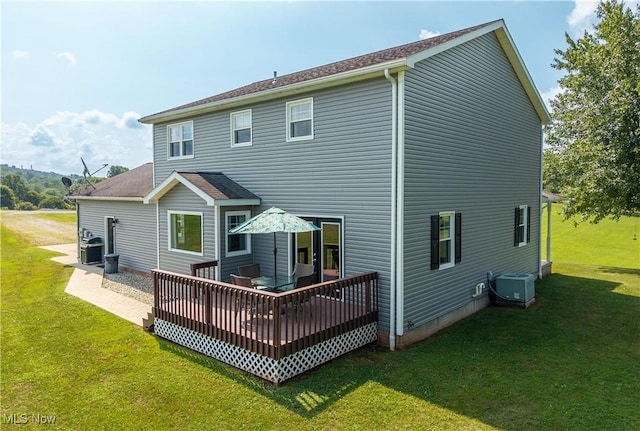 2939 Sandhill Rd, Marietta, OH 45750 - back of property with a lawn and a deck
