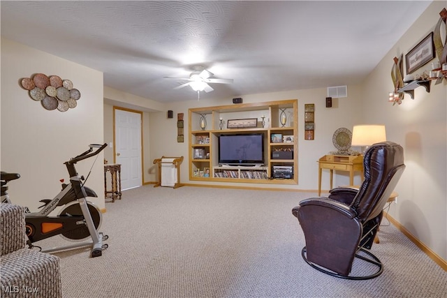 2939 Sandhill Rd, Marietta, OH 45750 - sitting room with carpet flooring, a ceiling fan, and an office area