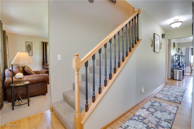 2939 Sandhill Rd, Marietta, OH 45750 - stairs with wood finished floors