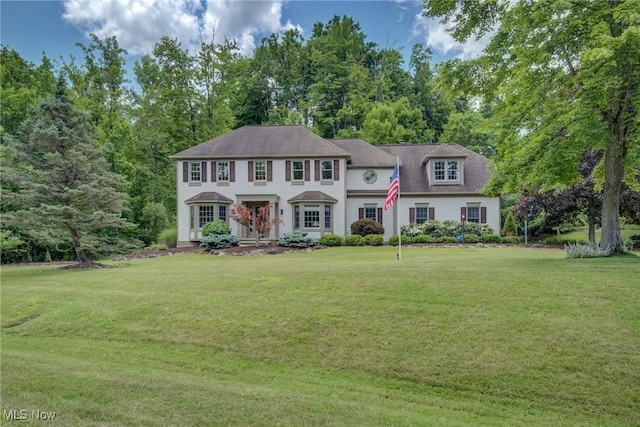 18367 Cranberry Ridge Ln, Chagrin Falls, OH 44023 - colonial house with a front yard and view of scattered trees