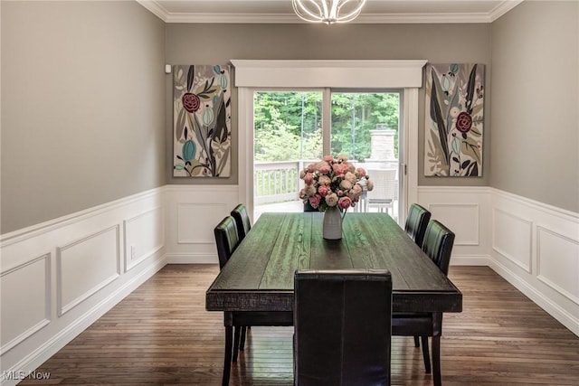 18367 Cranberry Ridge Ln, Chagrin Falls, OH 44023 - dining space featuring wood finished floors, crown molding, a decorative wall, and a wainscoted wall