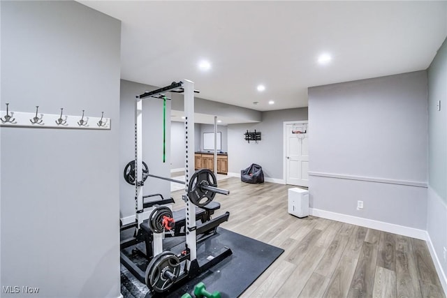 18367 Cranberry Ridge Ln, Chagrin Falls, OH 44023 - workout room with wood finished floors and recessed lighting