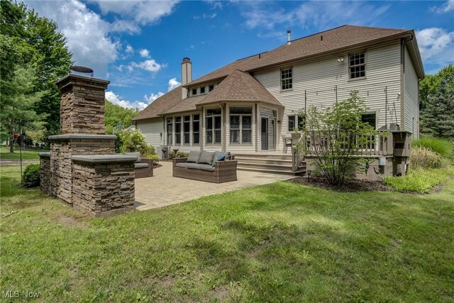 18367 Cranberry Ridge Ln, Chagrin Falls, OH 44023 - rear view of property with a patio, a yard, a wooden deck, and a chimney