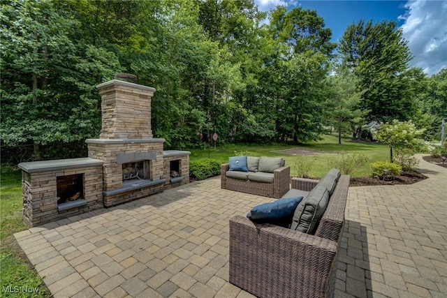 18367 Cranberry Ridge Ln, Chagrin Falls, OH 44023 - view of patio / terrace featuring an outdoor living space with a fireplace and view of scattered trees