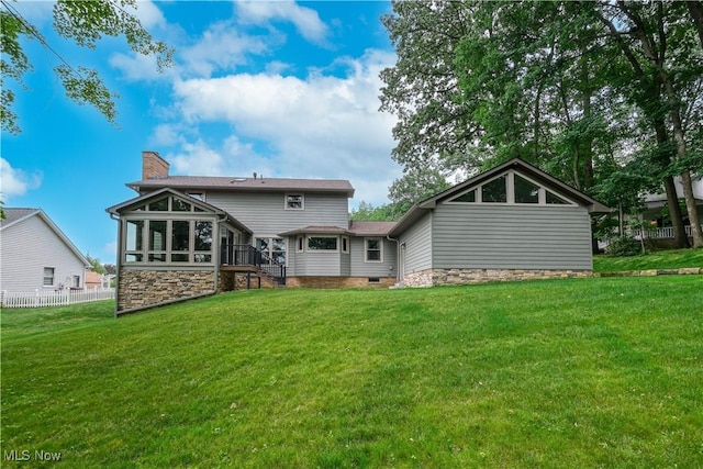 5835 Garth Cir NW, Canton, OH 44718 - back of property featuring a chimney and a sunroom