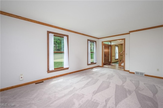 5835 Garth Cir NW, Canton, OH 44718 - carpeted empty room with crown molding and stairway