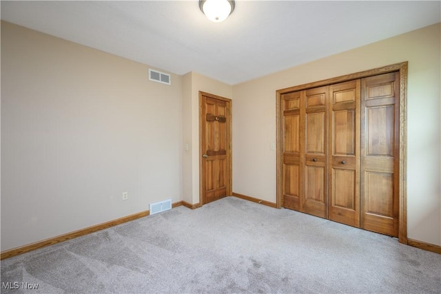 5835 Garth Cir NW, Canton, OH 44718 - unfurnished bedroom with carpet floors and a closet