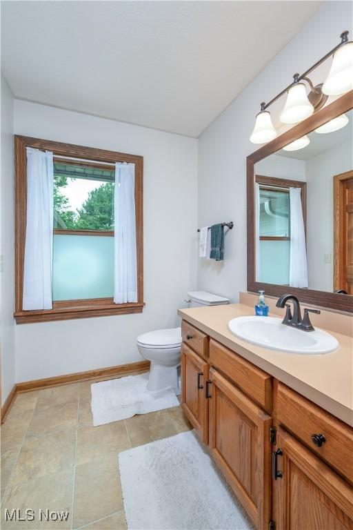 5835 Garth Cir NW, Canton, OH 44718 - bathroom featuring vanity and tile patterned floors
