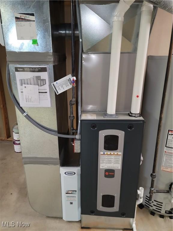 5835 Garth Cir NW, Canton, OH 44718 - utility room featuring gas water heater