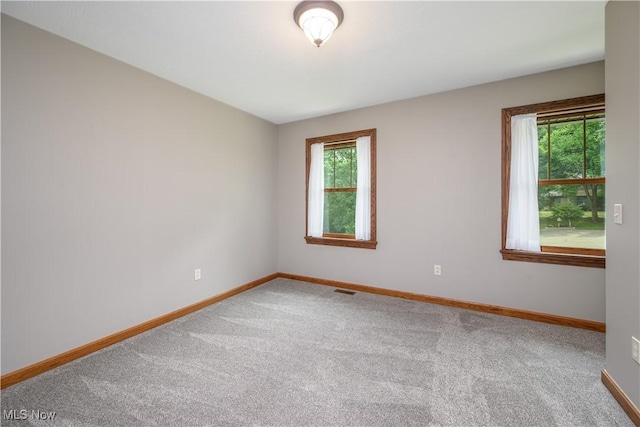 5835 Garth Cir NW, Canton, OH 44718 - empty room with baseboards and carpet floors