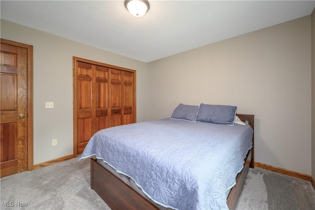 5835 Garth Cir NW, Canton, OH 44718 - carpeted bedroom with baseboards and a closet