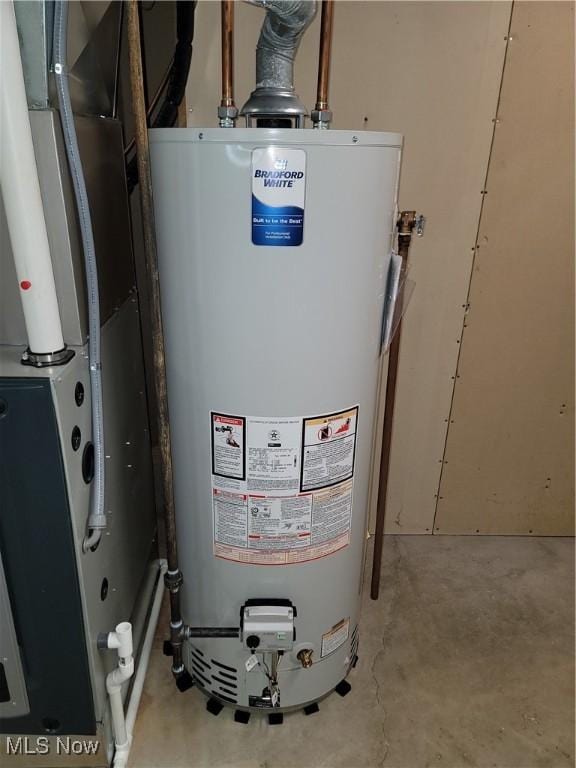 5835 Garth Cir NW, Canton, OH 44718 - utility room with gas water heater and heating unit