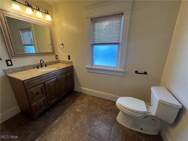 423 W Main St, Barnesville, OH 43713 - half bath featuring toilet and vanity
