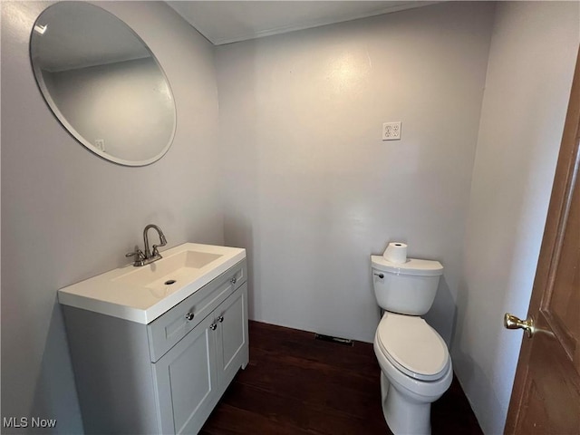 423 W Main St, Barnesville, OH 43713 - half bath with vanity and wood finished floors