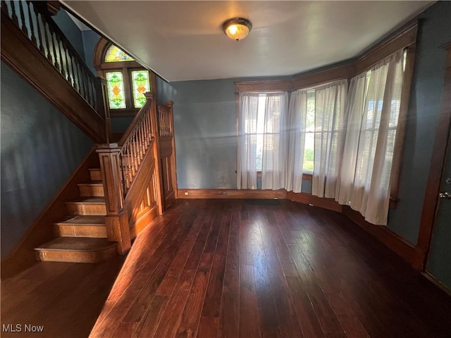 423 W Main St, Barnesville, OH 43713 - unfurnished living room with hardwood / wood-style floors and stairs