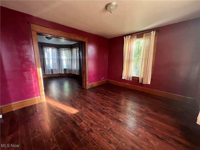 423 W Main St, Barnesville, OH 43713 - unfurnished room with baseboards and wood finished floors