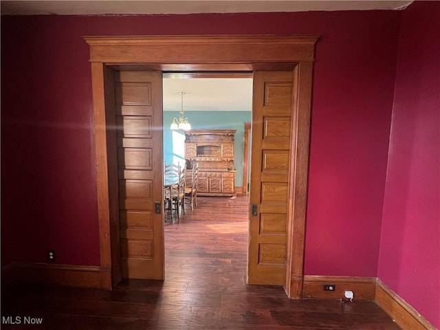 423 W Main St, Barnesville, OH 43713 - hall with a chandelier and wood finished floors