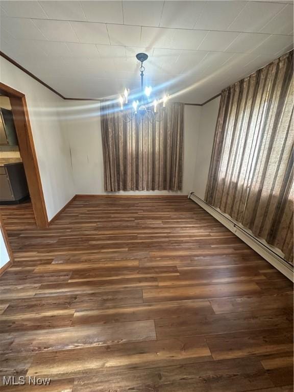 600 Jeanette Ave, Martins Ferry, OH 43935 - unfurnished room featuring wood finished floors and baseboard heating