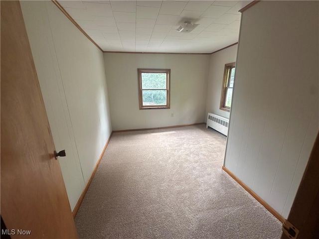 600 Jeanette Ave, Martins Ferry, OH 43935 - carpeted spare room featuring radiator and crown molding
