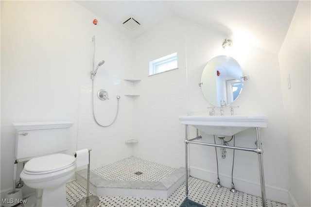 12 Lotus Ave, Chester, WV 26034 - bathroom with tiled shower and lofted ceiling