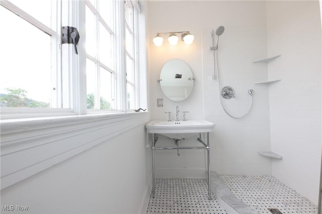 12 Lotus Ave, Chester, WV 26034 - bathroom featuring a tile shower and a sink