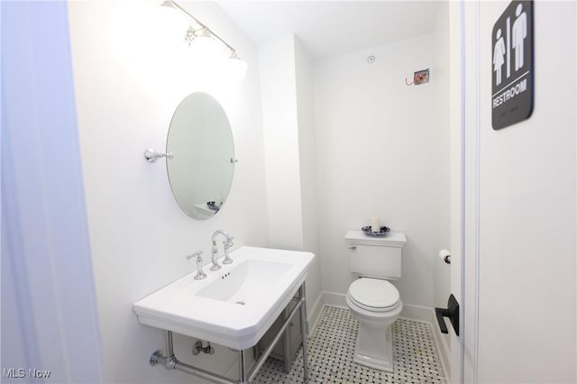 12 Lotus Ave, Chester, WV 26034 - bathroom with toilet and a sink